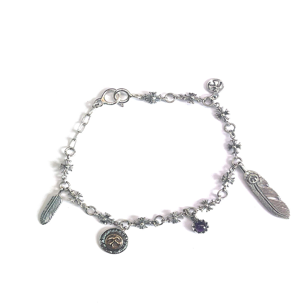 Cross pattern silver  bracelet with feather & purple stone