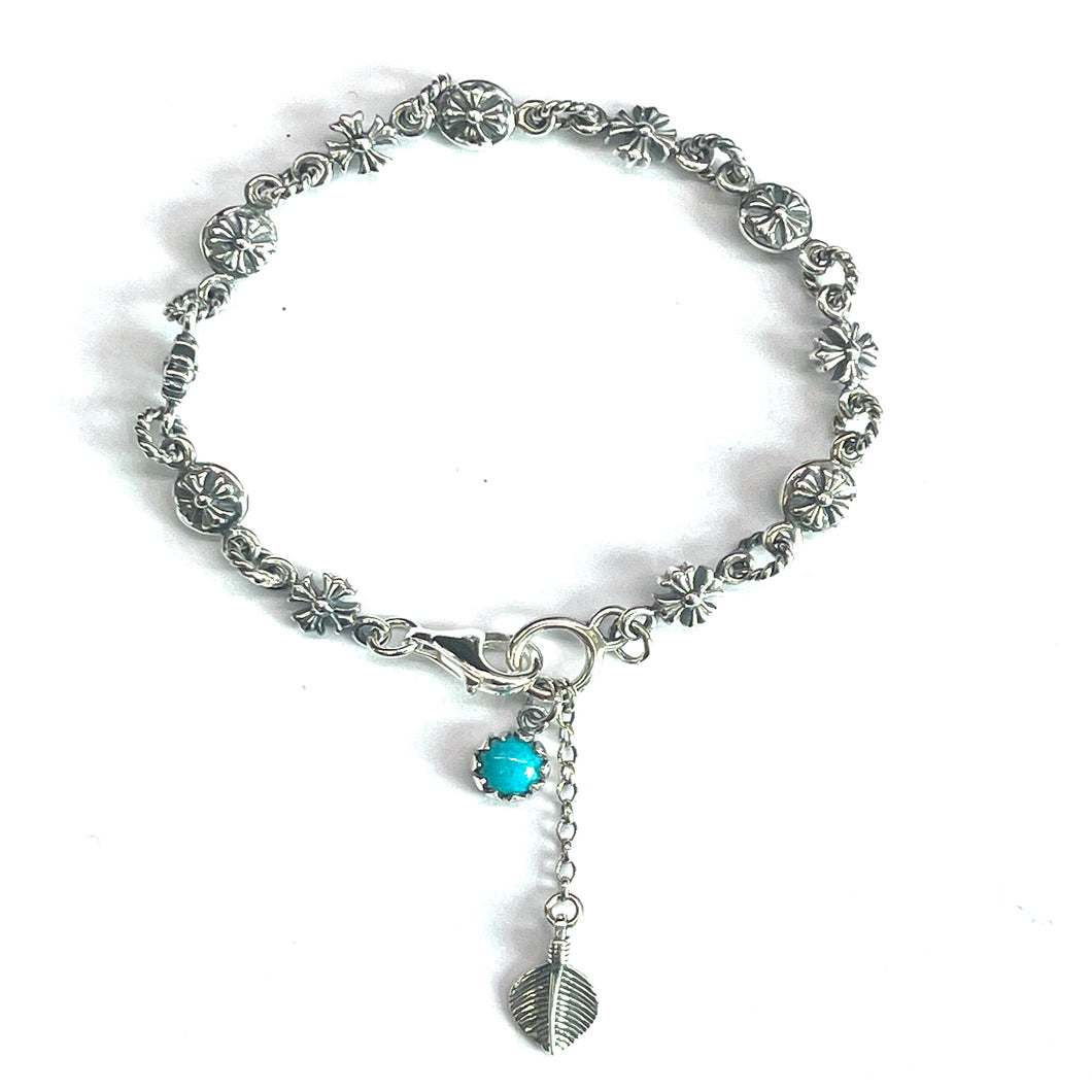 Cross pattern silver bracelet with turquoise & leave