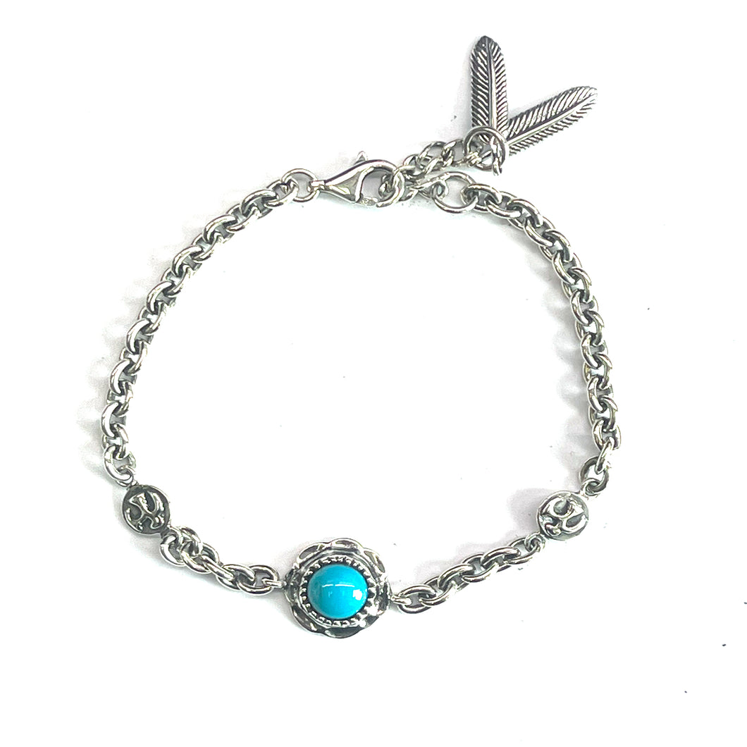 Silver bracelet with  big turquoise & feather