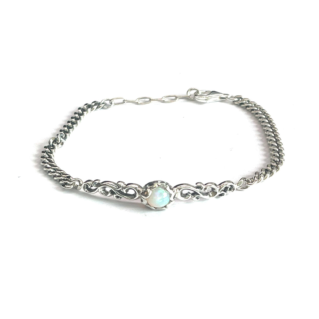 Silver bracelet with  opal & seagrass pattern